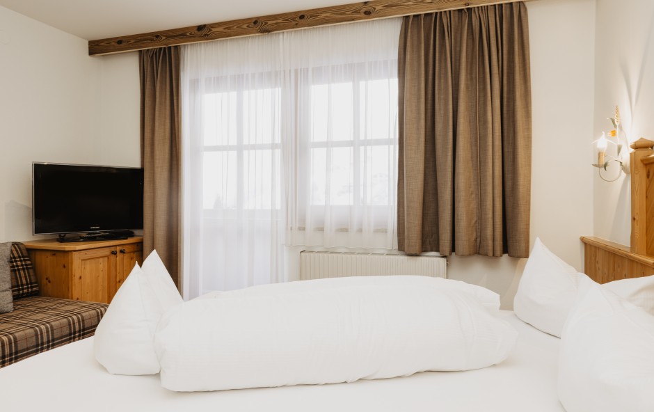 Doppelzimmer L im Hotel Dorfer mit gem&uuml;tlichem Bett